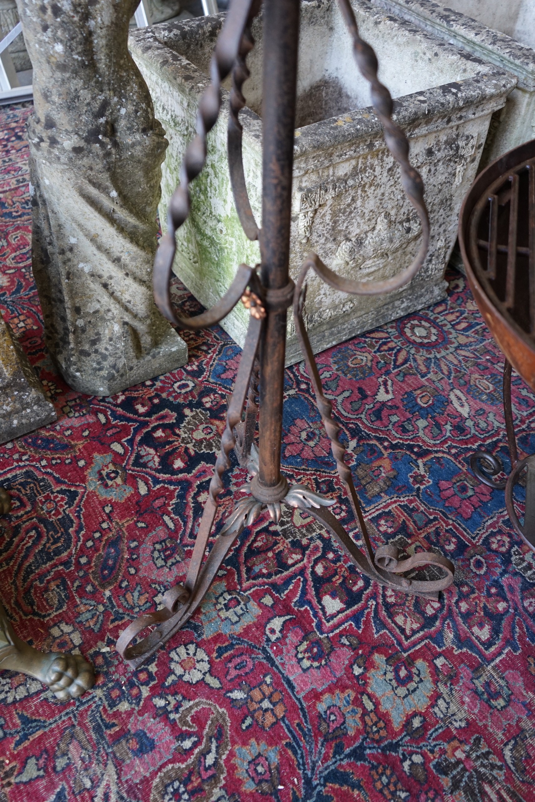 An early 20th century copper mounted wrought iron telescopic oil lamp standard